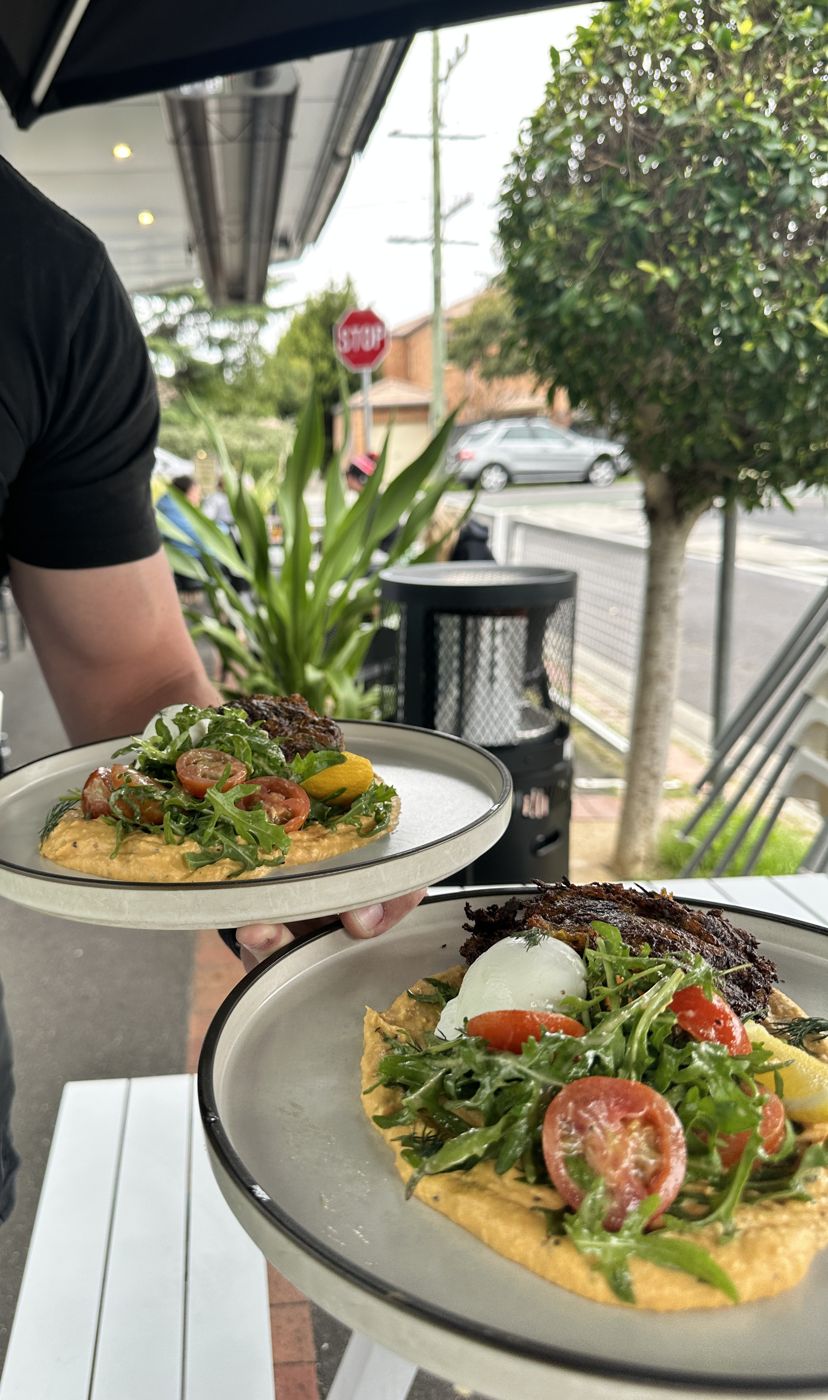 Plates going out to a table during service